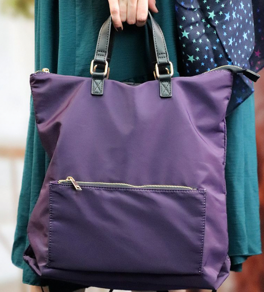 Purple nylon backpack with zip front pocket