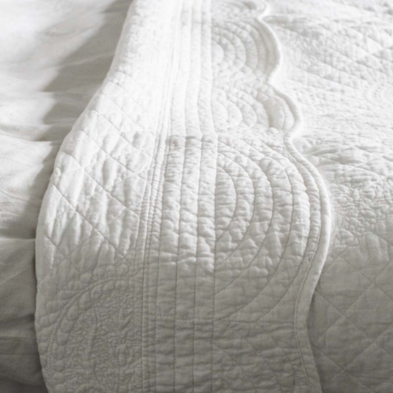 White cotton quilted shop bedspread