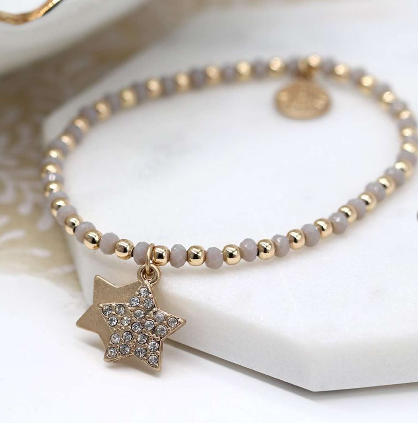 Gold/Grey  braclet with  charms